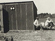 construction shack and storehouse looking north